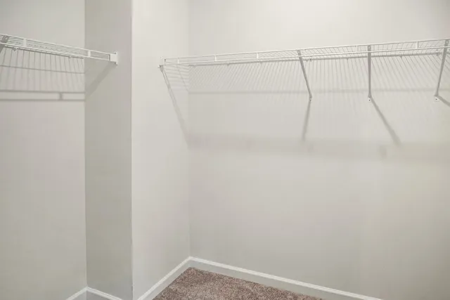 a view of a room with racks on the wall