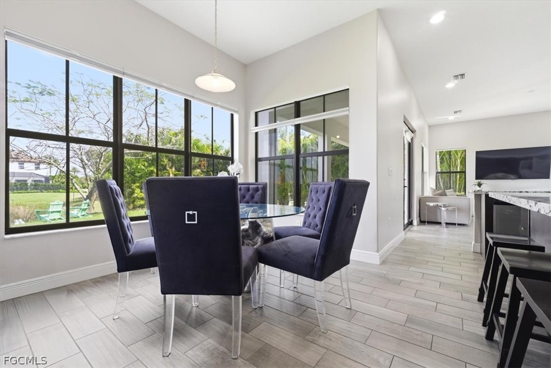 5245 Messina Street Ave Maria, FL 34142 - Photo 13 of 44 a view of a livingroom with furniture window and outside view