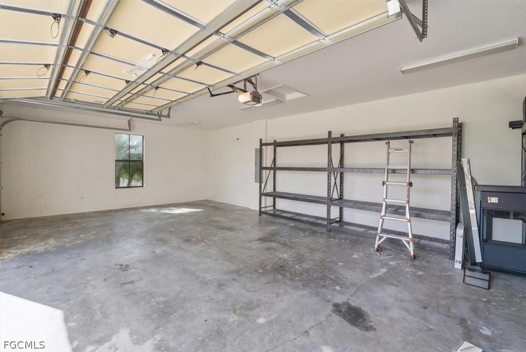 5245 Messina Street Ave Maria, FL 34142 - Photo 24 of 44 a view of a room with gym equipment