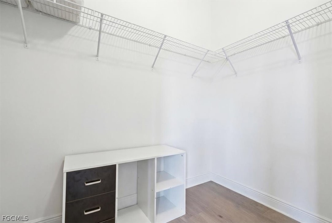 5245 Messina Street Ave Maria, FL 34142 - Photo 31 of 44 a view of a room with racks on the wall