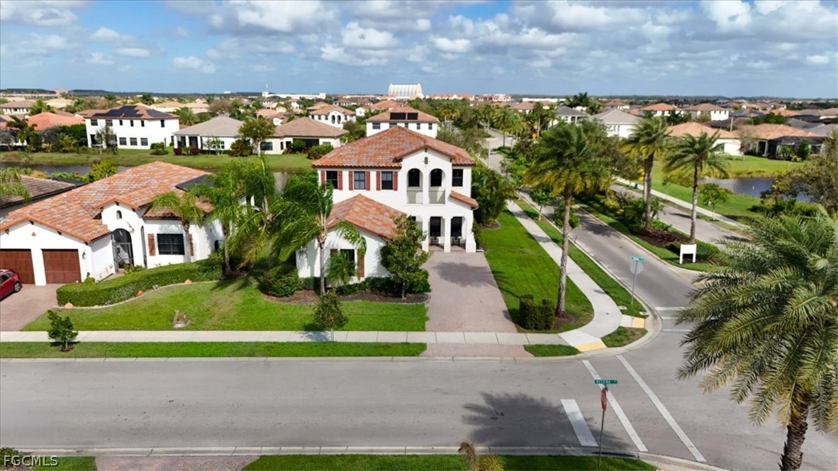 5245 Messina Street Ave Maria, FL 34142 - Photo 38 of 44 a aerial view of a house