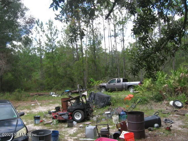 a view of a table and chairs in roof deck