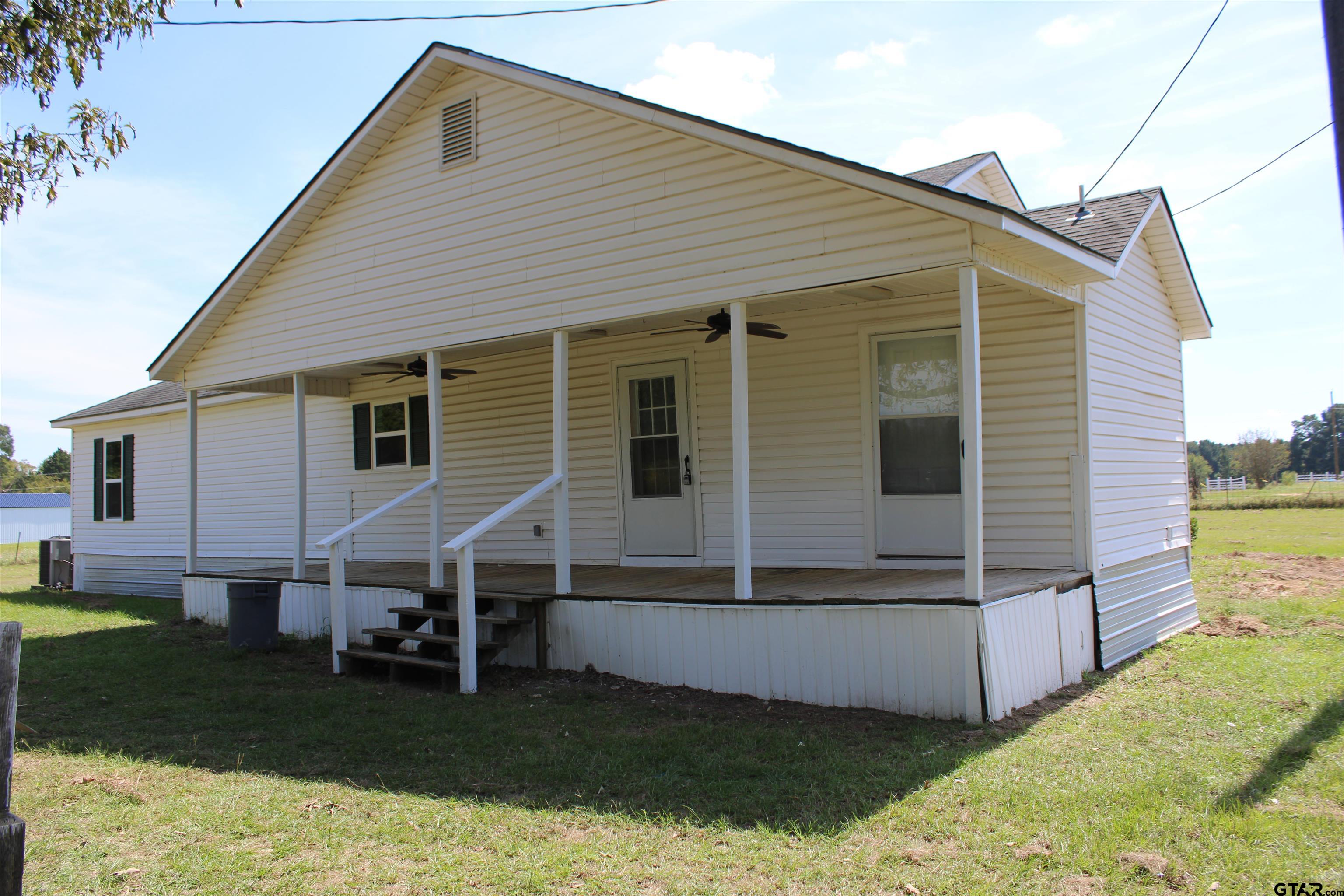 1055 County Road 1314 Rusk, TX 75785 - Photo 17 of 25 a view of house with backyard