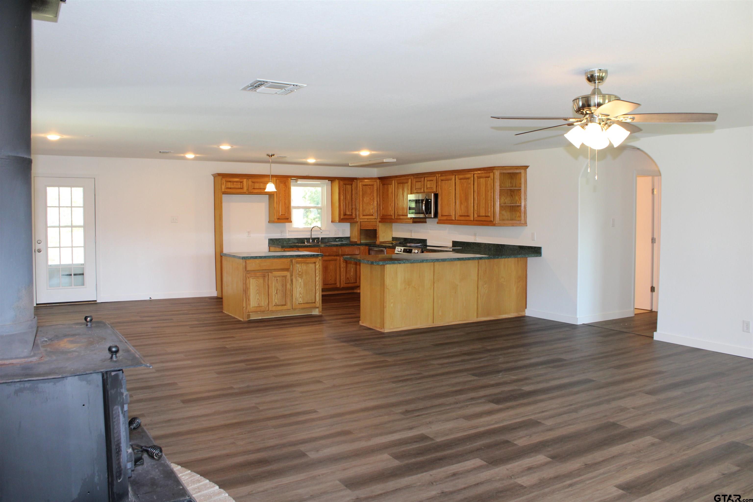 1055 County Road 1314 Rusk, TX 75785 - Photo 24 of 25 a view of kitchen with sink microwave and stove