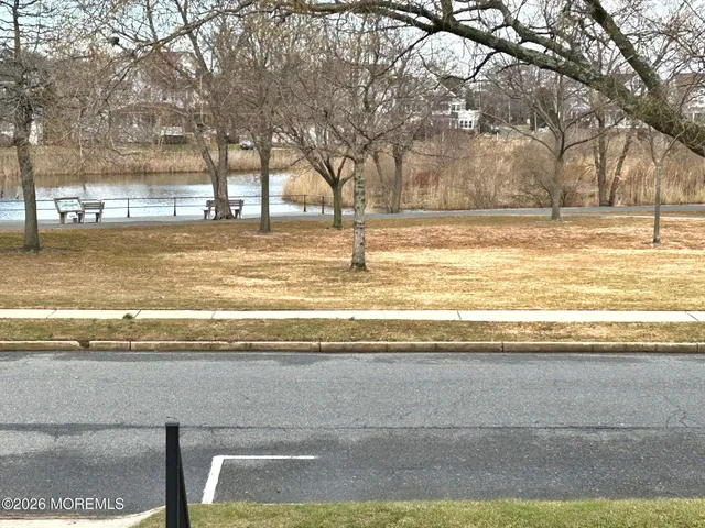 a view of yard with a fountain