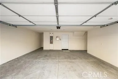 a view of a livingroom with a ceiling fan and window