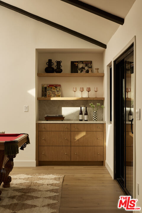 17539 West Magnolia Boulevard Encino, CA 91316 - Photo 14 of 31 a room with storage and utility