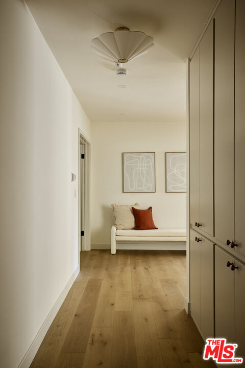 17539 West Magnolia Boulevard Encino, CA 91316 - Photo 20 of 31 a living room with furniture and a table
