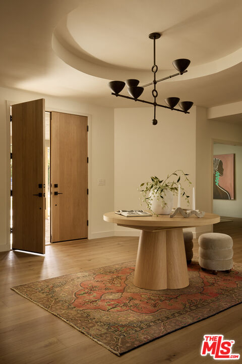 17539 West Magnolia Boulevard Encino, CA 91316 - Photo 4 of 31 a view of living room with granite countertop furniture and chandelier