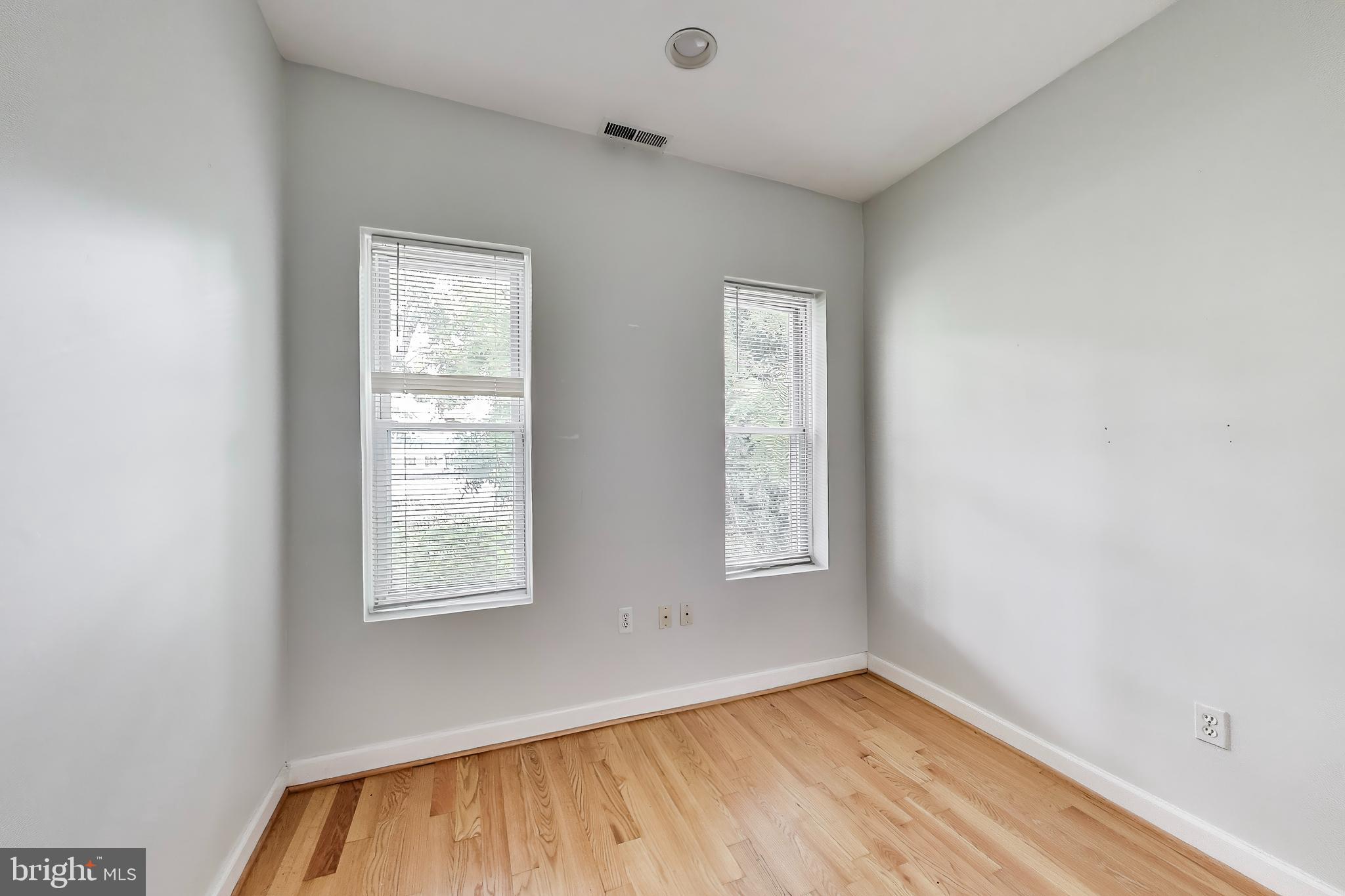 1327 1st Street Northwest Washington, DC 20001 - Photo 13 of 18 an empty room with windows