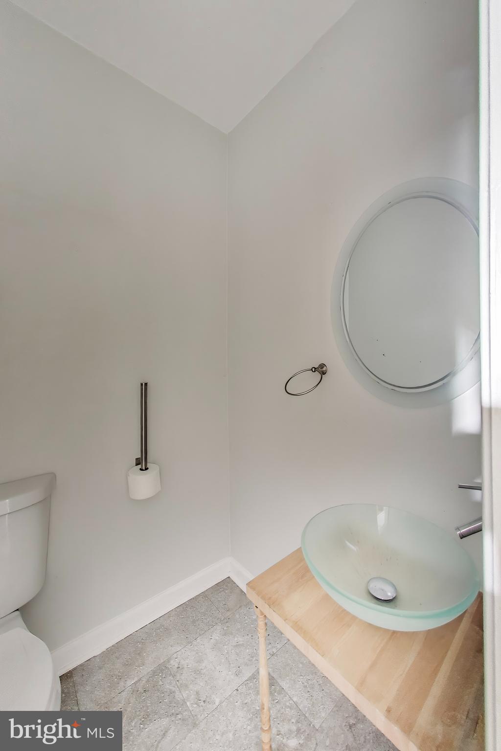 1327 1st Street Northwest Washington, DC 20001 - Photo 7 of 18 a bathroom with a sink and a mirror