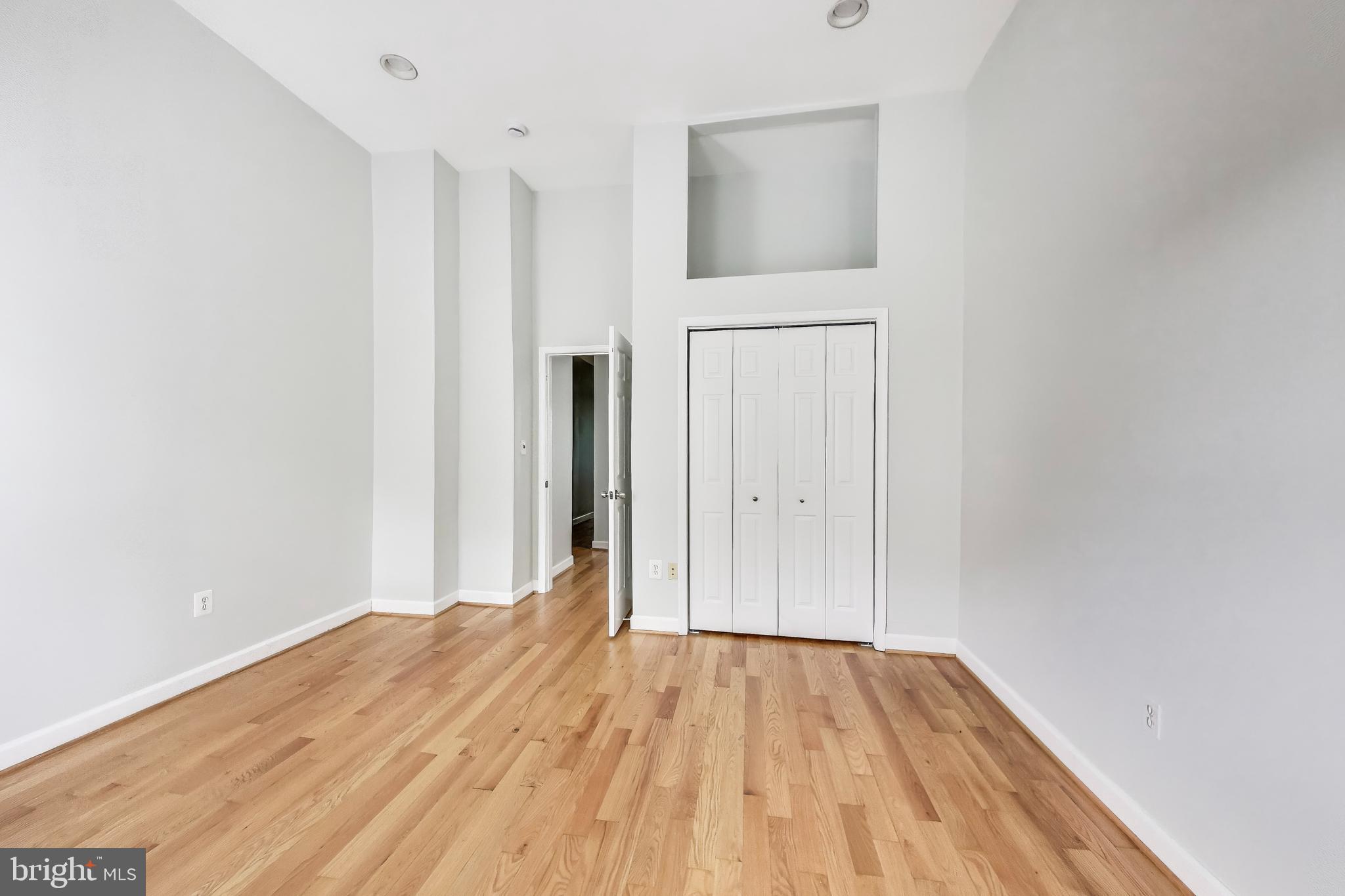 1327 1st Street Northwest Washington, DC 20001 - Photo 10 of 18 a view of a room with wooden floor