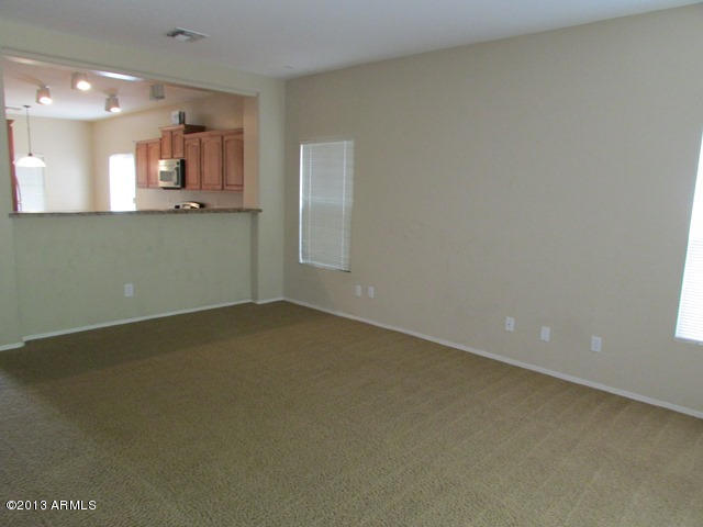 5343 West Fremont Road Laveen, AZ 85339 - Photo 7 of 16 Great room looking into kitchen