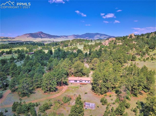 2325 Doe Valley Road Guffey, CO 80820 - Photo 2 of 18 Humble well loved and kept home in paradise.