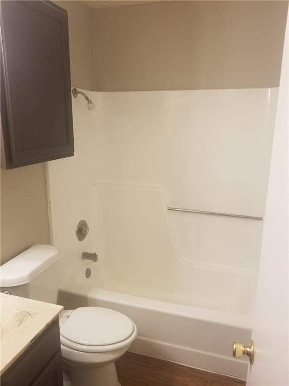 1214 Orchard Park Circle Pflugerville, TX 78660 - Photo 15 of 15 a bathroom with a toilet and a bathtub