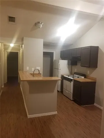 a room with wooden cabinets