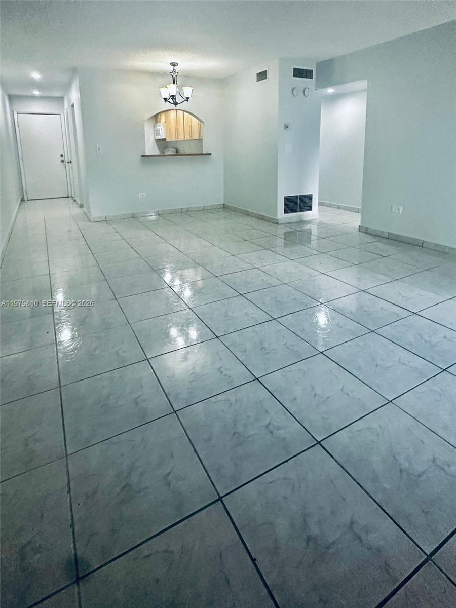 8101 Southwest 73rd Avenue, Unit 28 Miami, FL 33143 - Photo 6 of 21 a view of a livingroom with a fireplace