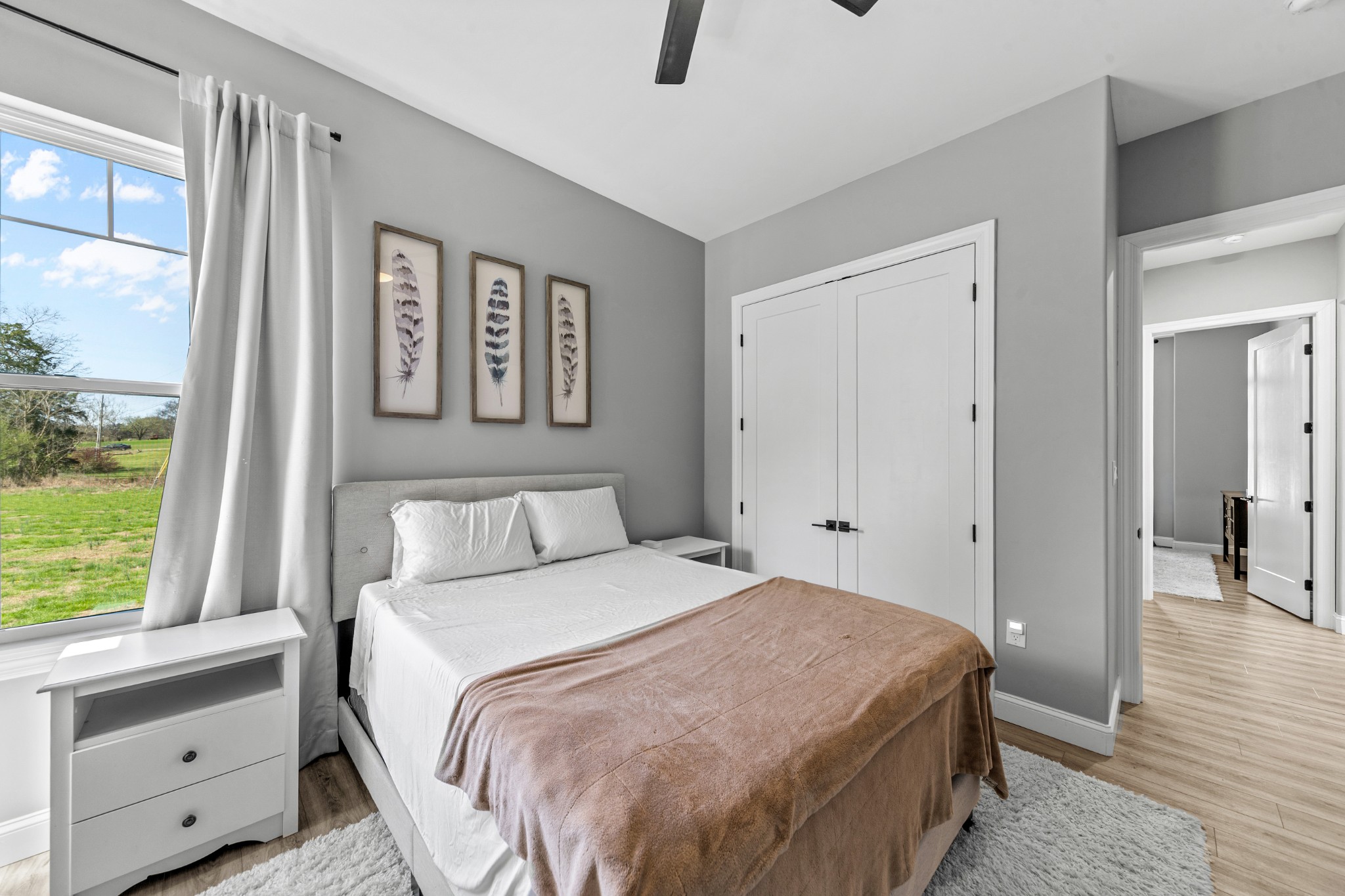 4770 Delina Road Cornersville, TN 37047 - Photo 12 of 71 a bedroom with a large bed and a window