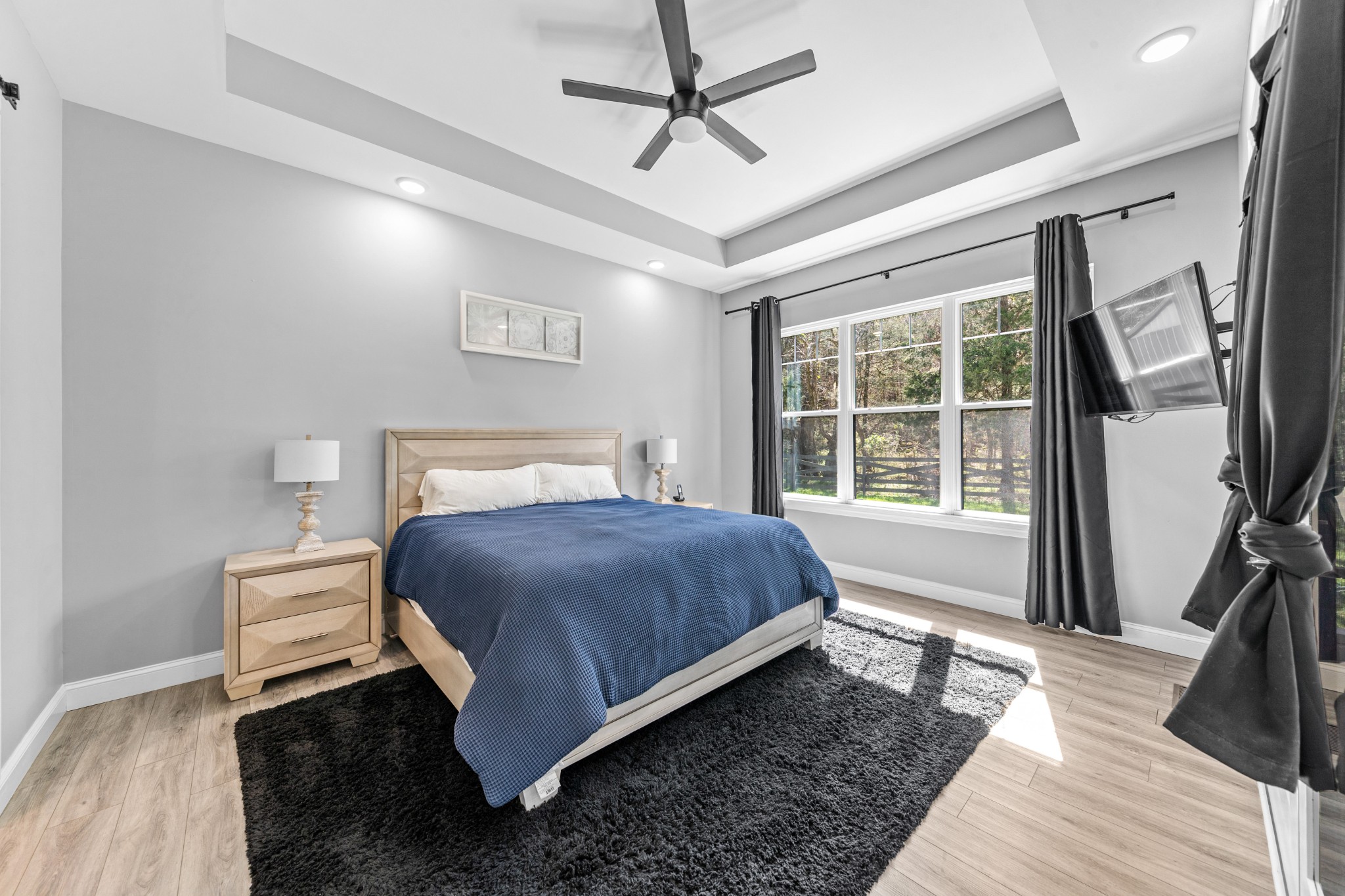 4770 Delina Road Cornersville, TN 37047 - Photo 13 of 71 a bedroom with a bed painting and a large window