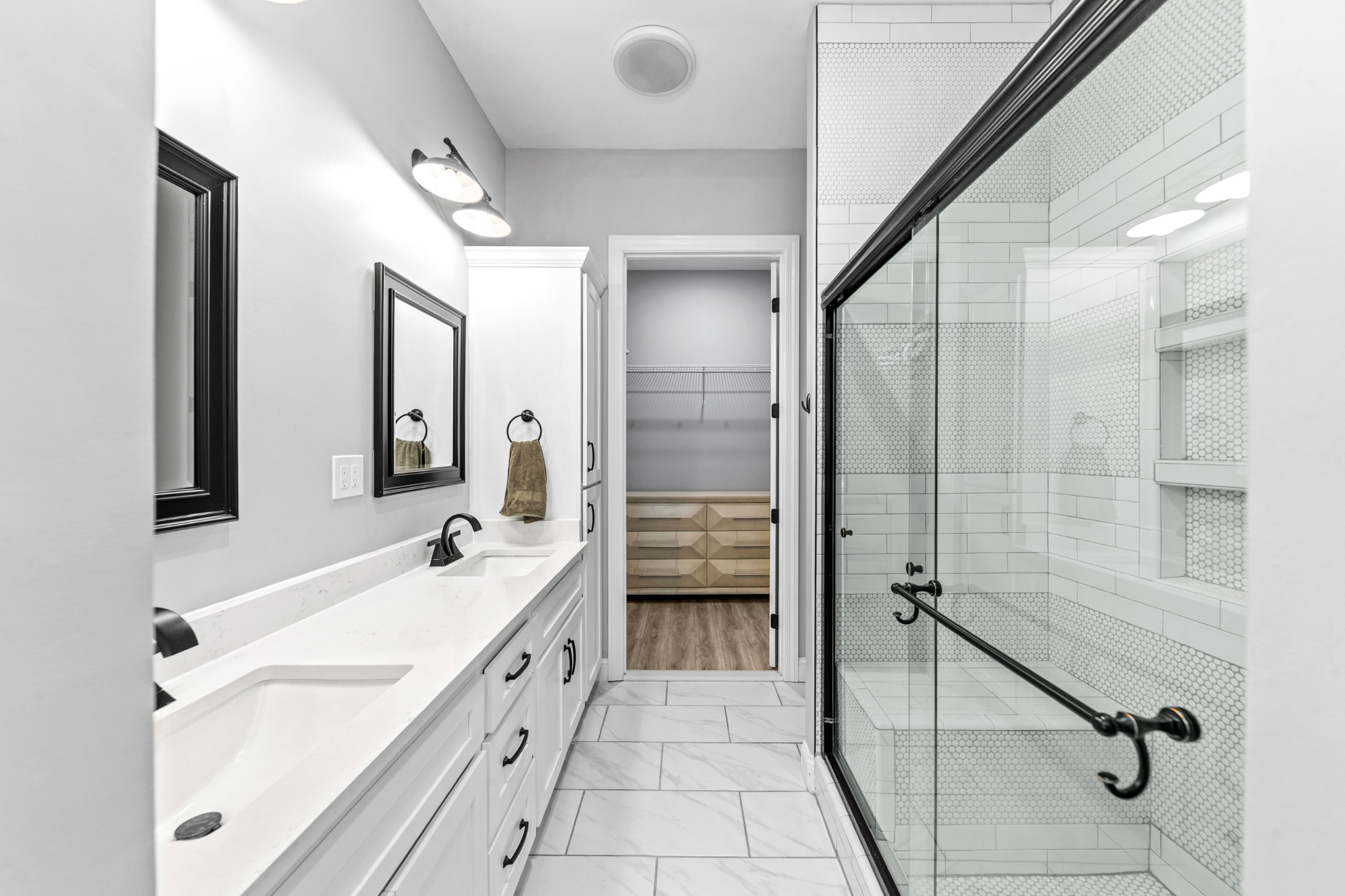 4770 Delina Road Cornersville, TN 37047 - Photo 15 of 71 a spacious bathroom with a double vanity sink a mirror and a shower