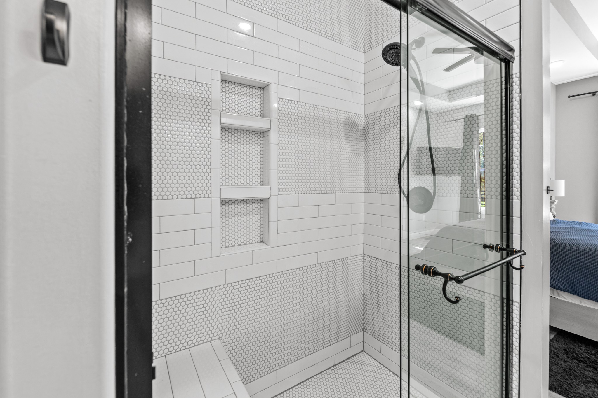 4770 Delina Road Cornersville, TN 37047 - Photo 16 of 71 a bathroom with a glass shower door