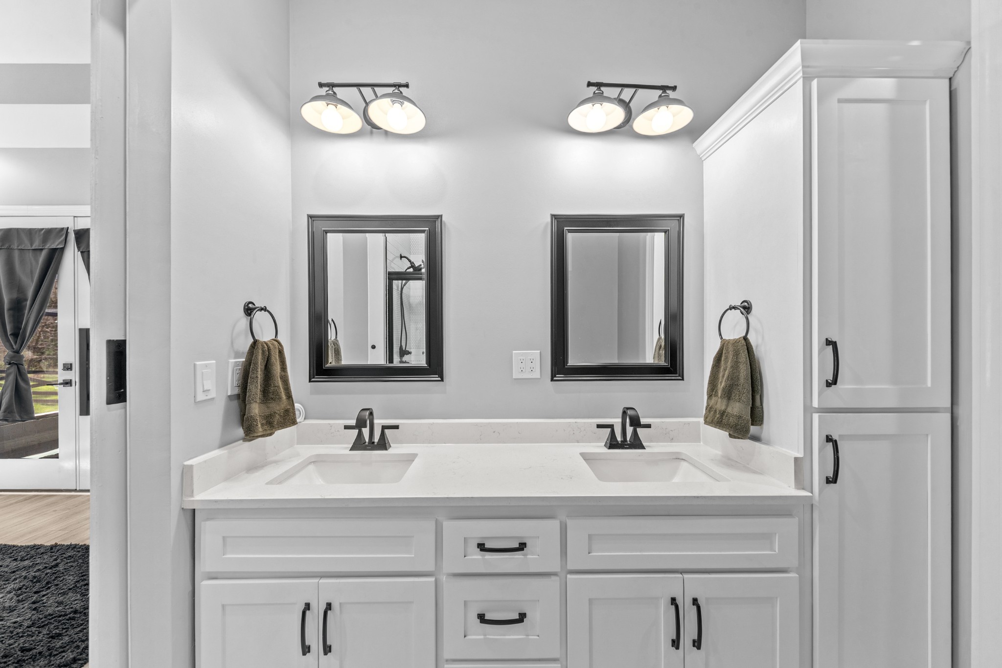 4770 Delina Road Cornersville, TN 37047 - Photo 17 of 71 a bathroom with double vanity sinks and a mirror