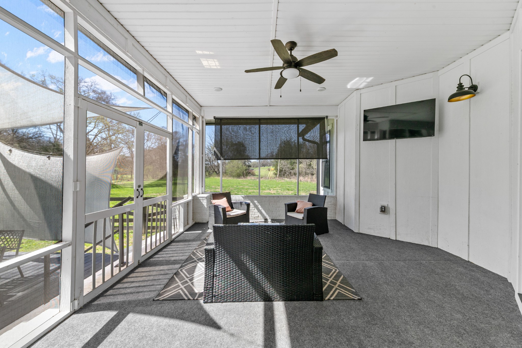 4770 Delina Road Cornersville, TN 37047 - Photo 21 of 71 a view of a livingroom with furniture window and a ceiling fan