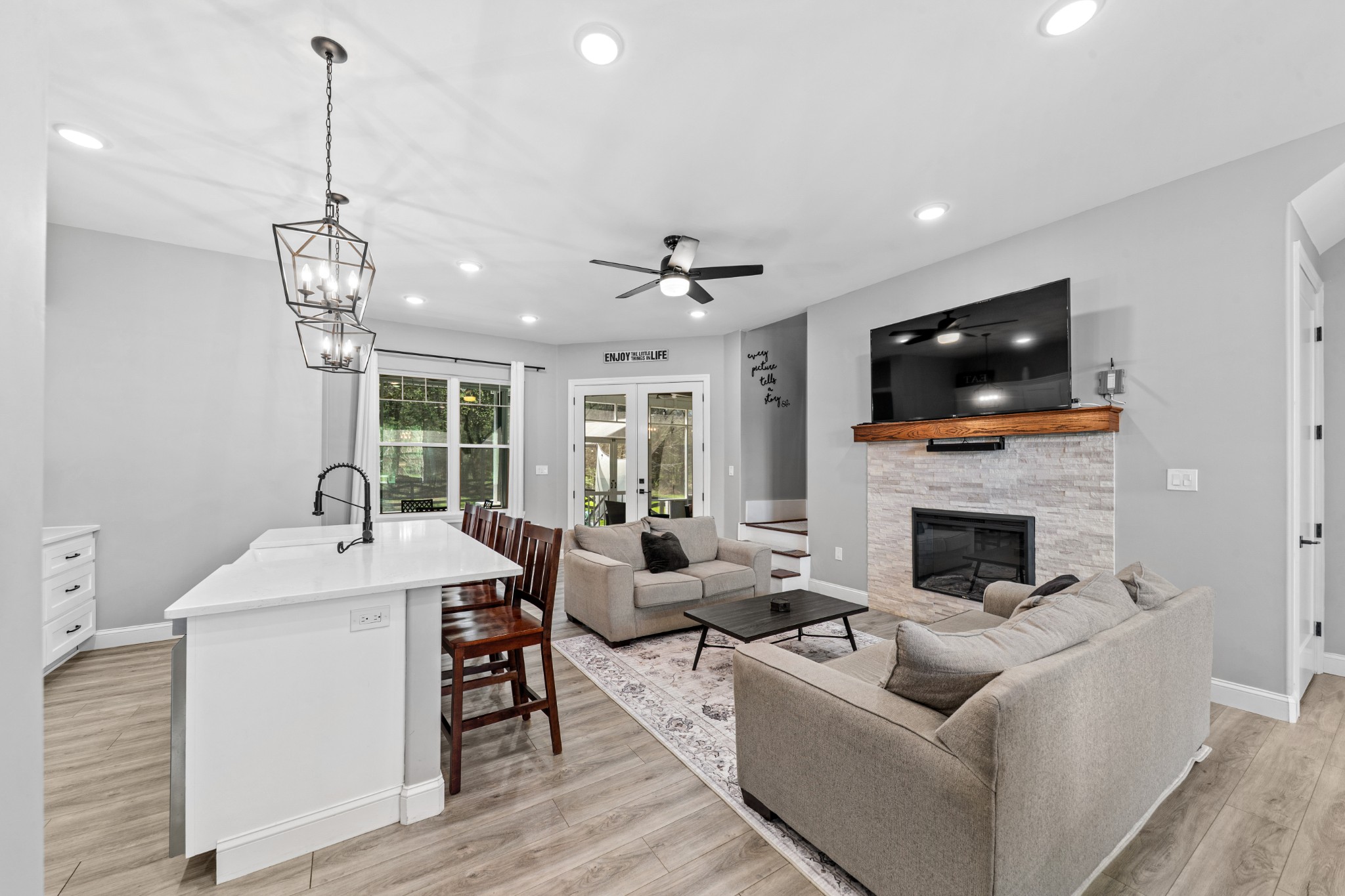 4770 Delina Road Cornersville, TN 37047 - Photo 33 of 71 a living room with furniture a fireplace and a flat screen tv