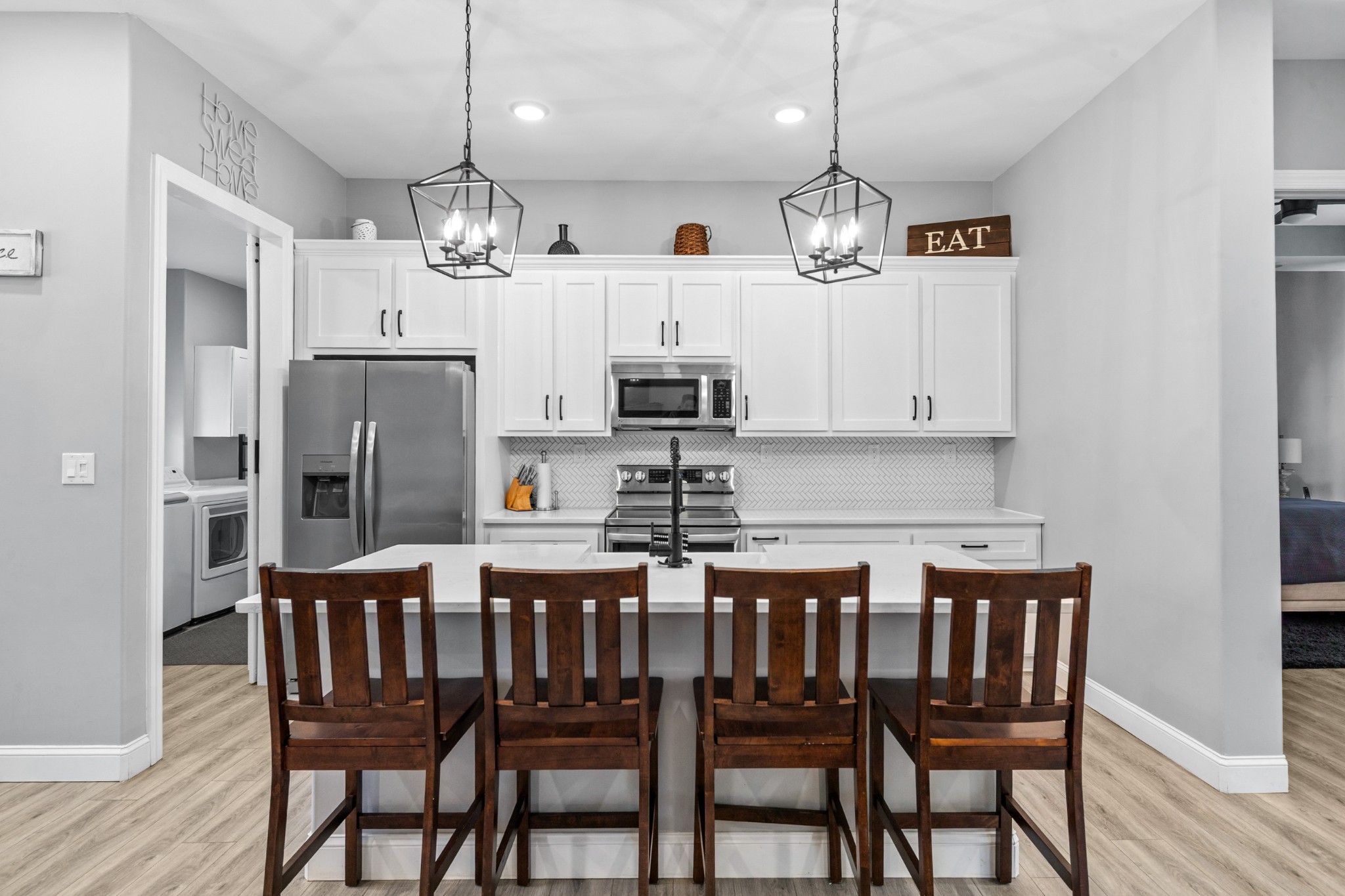 4770 Delina Road Cornersville, TN 37047 - Photo 38 of 71 a view of a dining room with furniture wooden floor and chandelier