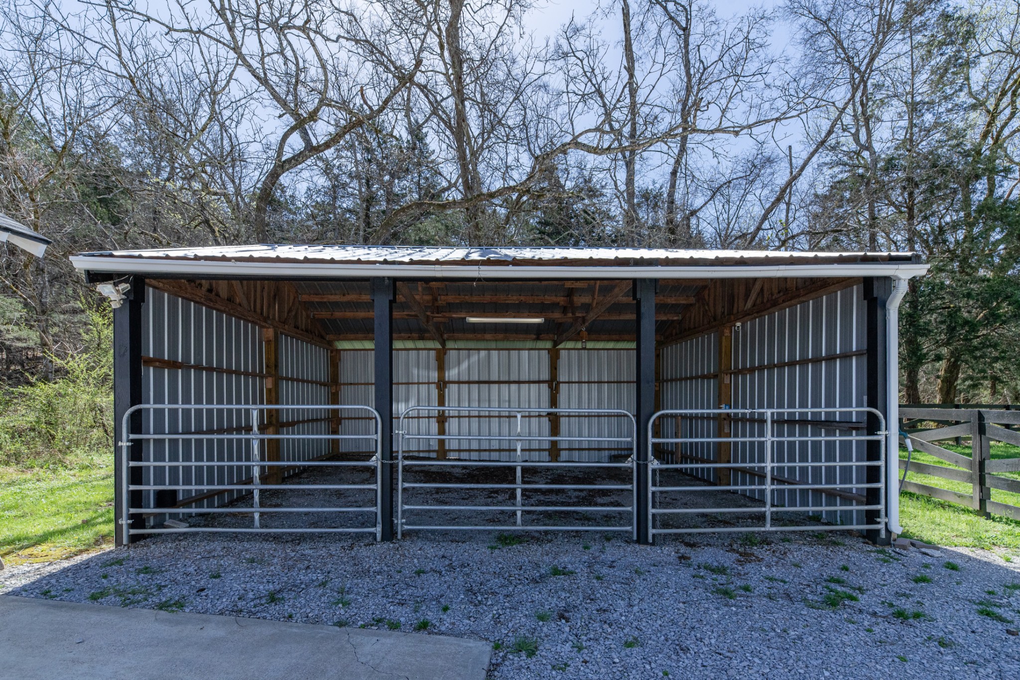 4770 Delina Road Cornersville, TN 37047 - Photo 48 of 71 a view of a house with a yard and wooden fence