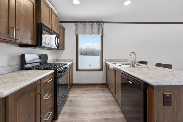 $199,900 | 153 2nd Street Southwest, Henriette, MN 55036