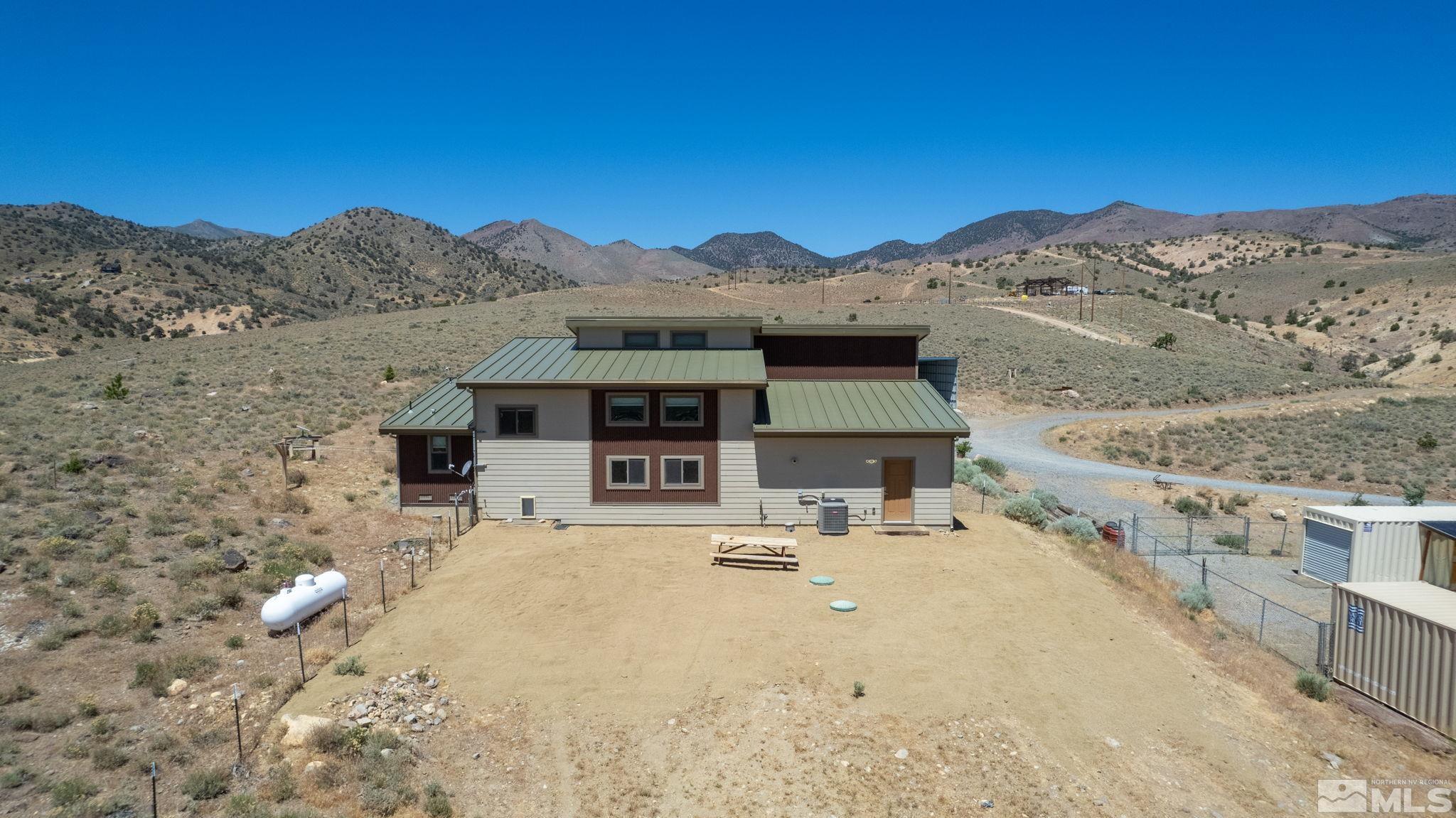 205 Eagle Vw Trail Dayton, NV 89403 - Photo 2 of 40 a view of a house with a mountain in the background