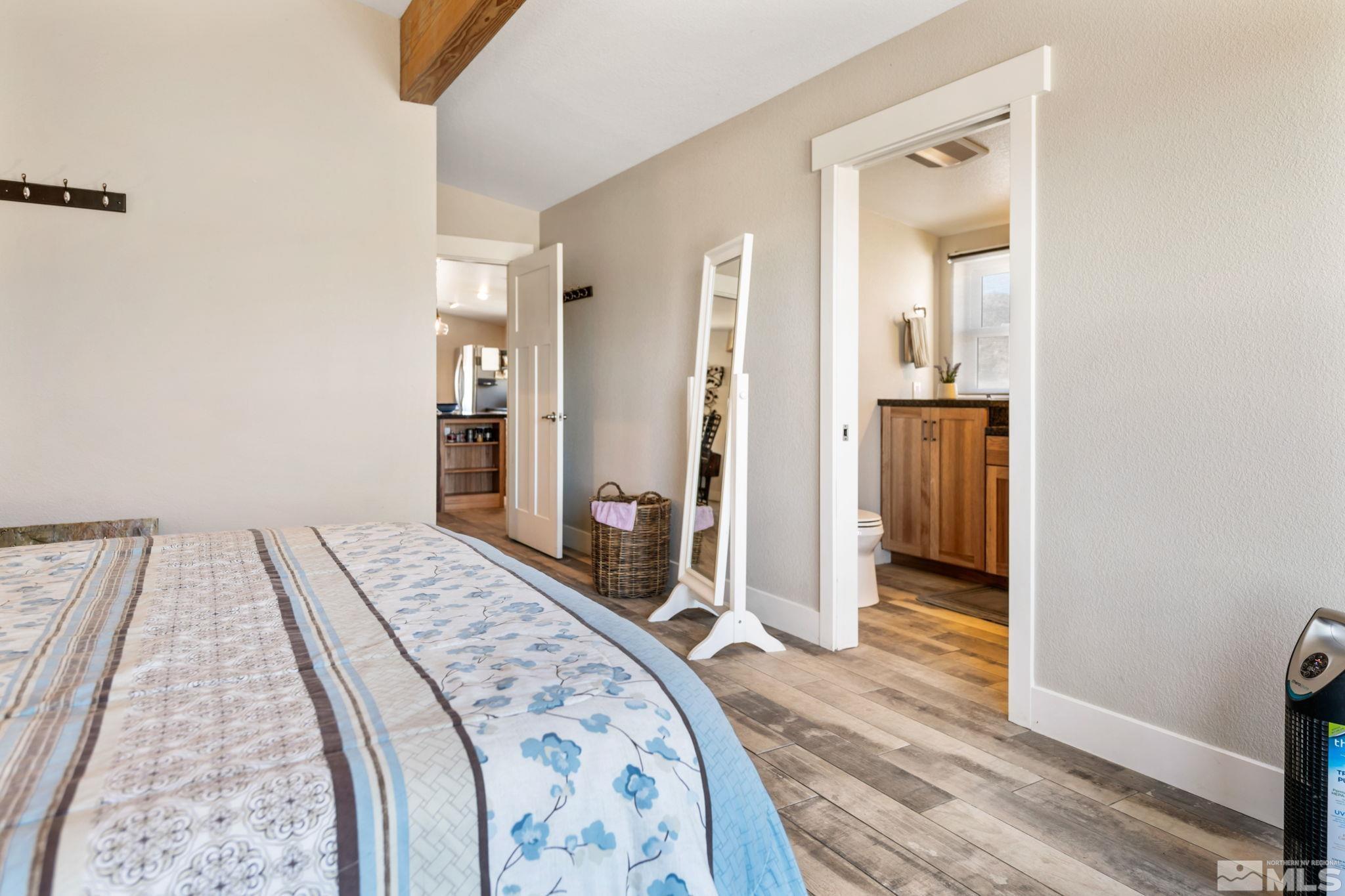 205 Eagle Vw Trail Dayton, NV 89403 - Photo 23 of 40 a bedroom with a bed and a mirror