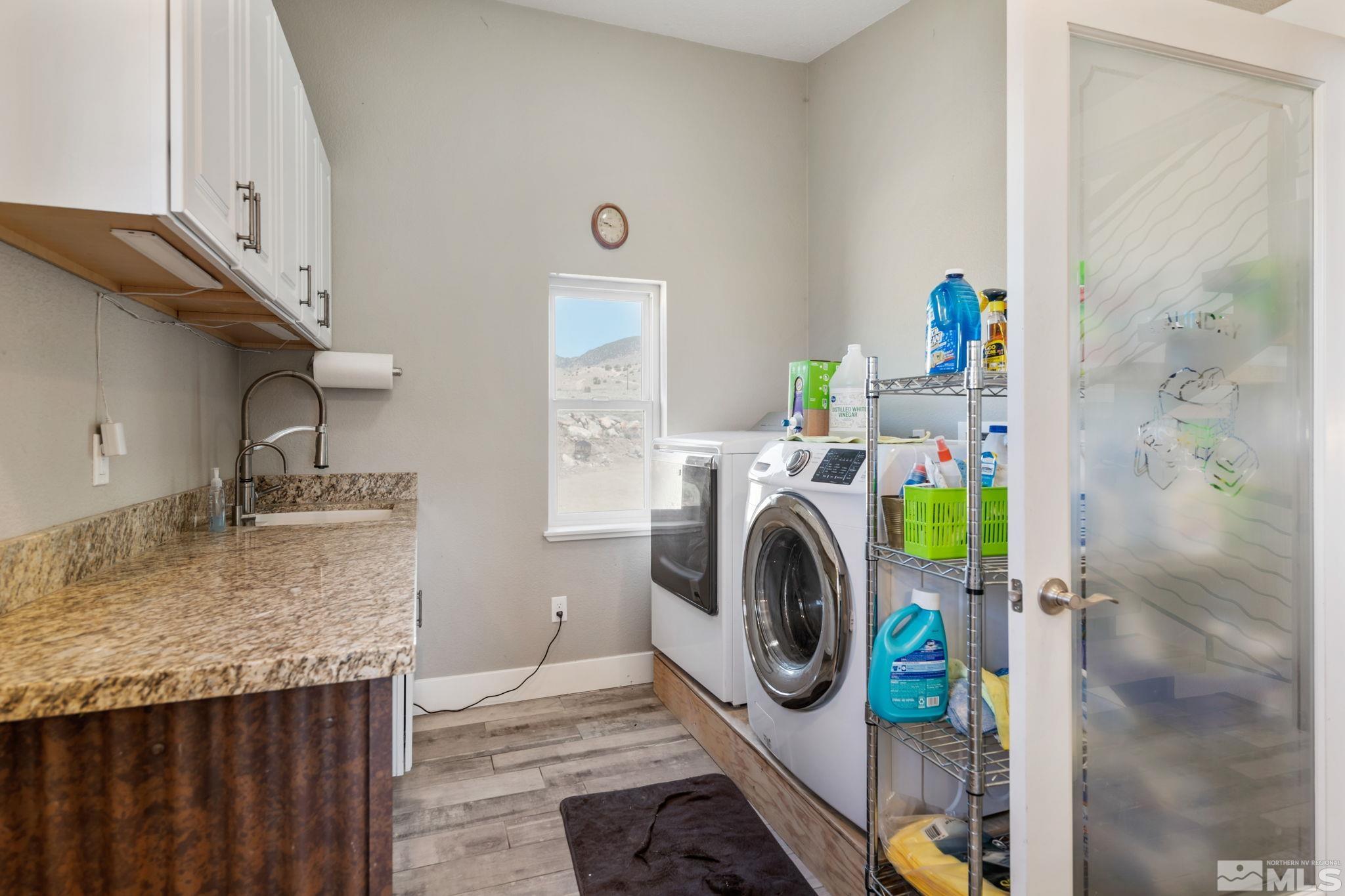 205 Eagle Vw Trail Dayton, NV 89403 - Photo 5 of 40 a utility room with dryer and washer