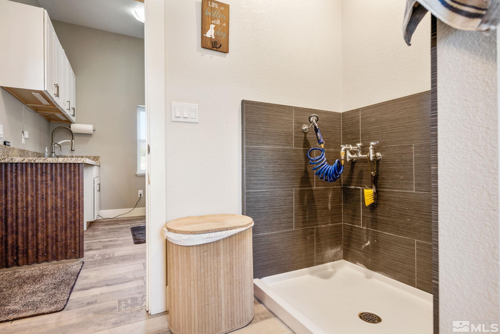 205 Eagle Vw Trail Dayton, NV 89403 - Photo 7 of 40 a bathroom with a shower and toilet