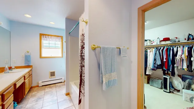 a view of a kitchen with appliances and a window