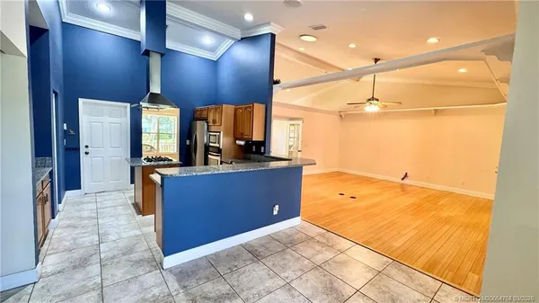 a living room with a couch and a window