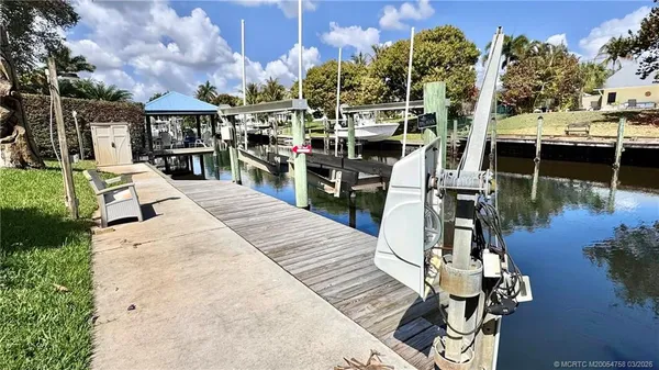 an aerial view of a houses with outdoor space