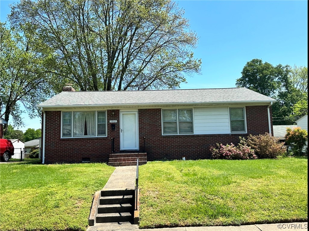 3907 Rosedale Avenue Richmond, VA 23227 - Photo 2 of 10 front view of a house with a yard