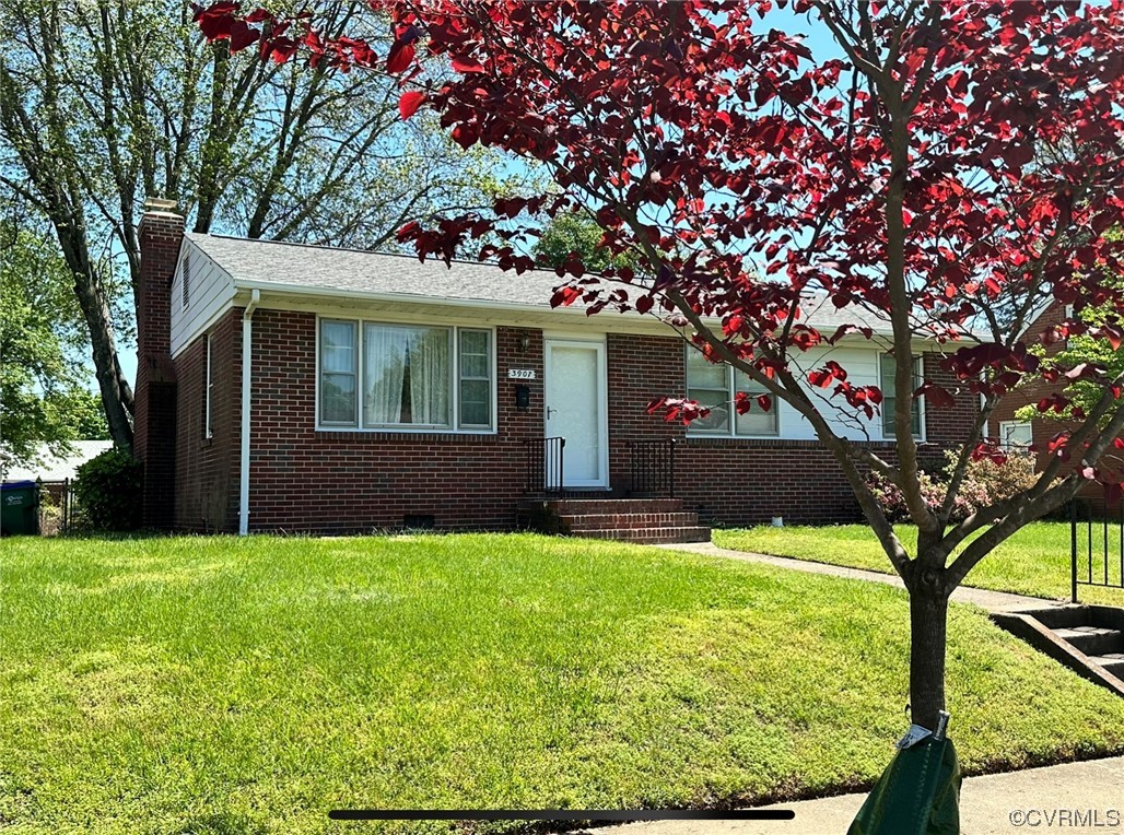 3907 Rosedale Avenue Richmond, VA 23227 - Photo 3 of 10 a view of a house with a yard