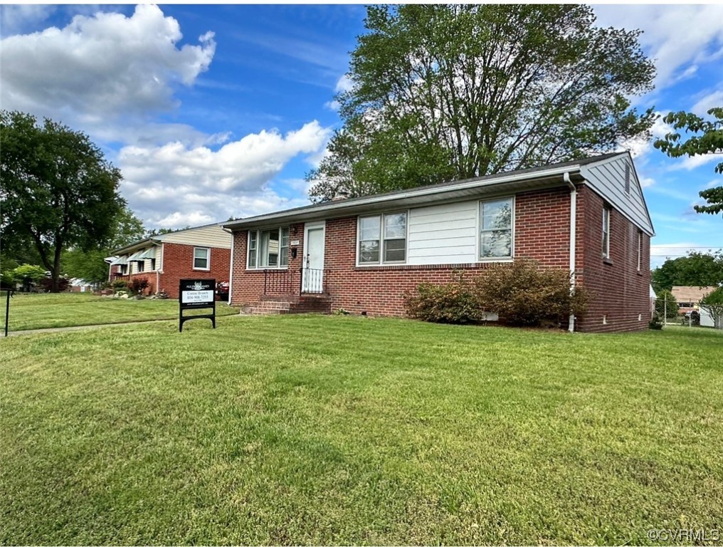 3907 Rosedale Avenue Richmond, VA 23227 - Photo 7 of 10 a house view with a garden space