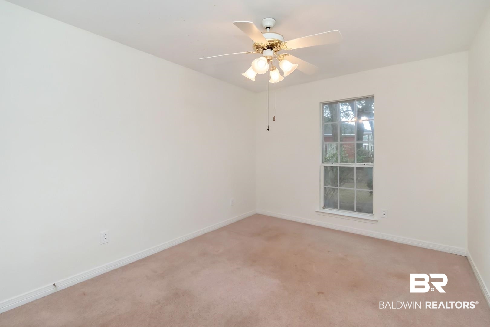 10006 Wedgefield Court Mobile, AL 36608 - Photo 33 of 34 Unfurnished room with light carpet, ceiling fan, and baseboards