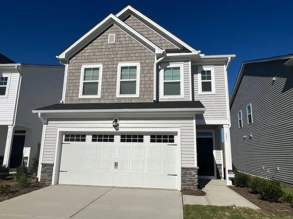a view of a house with garage