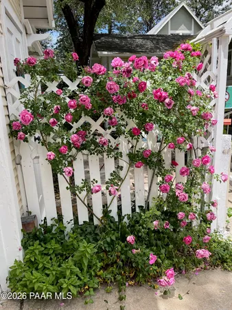 front view of a house with a large window