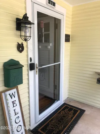 a bathroom with a shower and a mirror