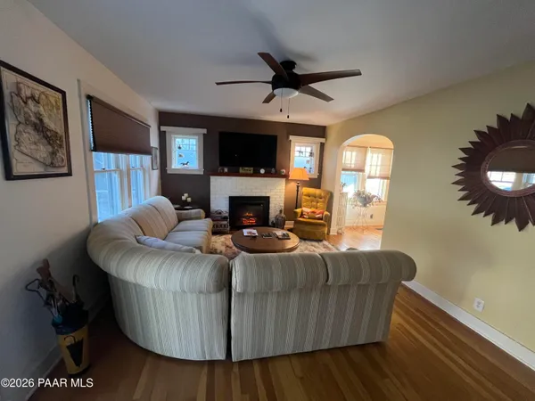 a kitchen with a refrigerator and a sink