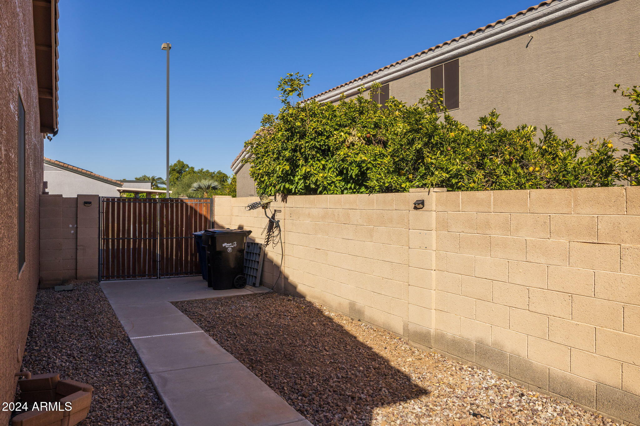 3355 East Los Altos Road Gilbert, AZ 85297 - Photo 34 of 34 a view of a back yard from a balcony