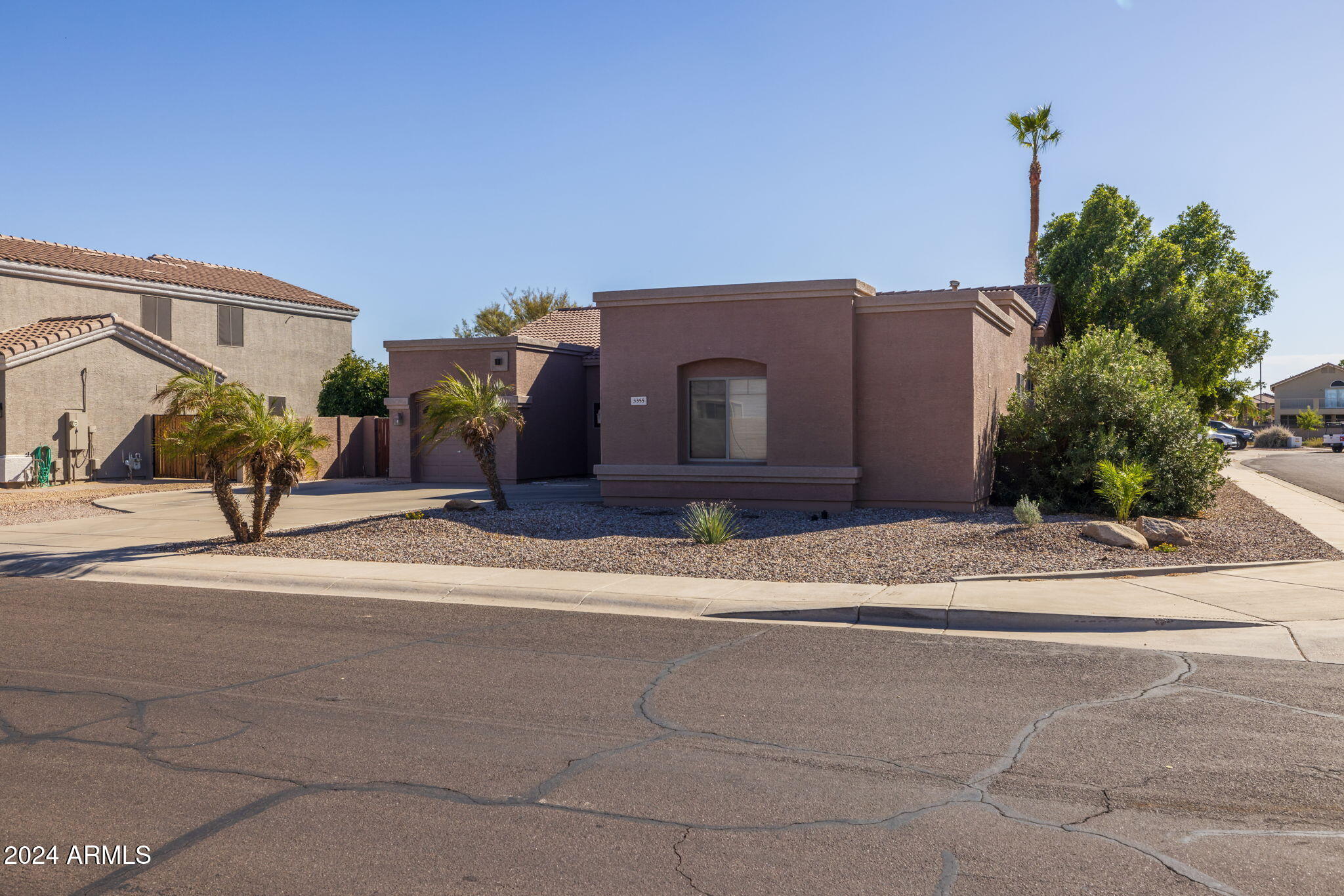 3355 East Los Altos Road Gilbert, AZ 85297 - Photo 4 of 34 front view of a house with a yard