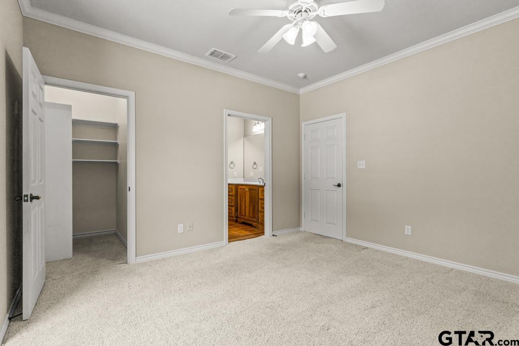100 Lantana Road Gilmer, TX 75644 - Photo 17 of 30 an empty room with fan and entrance
