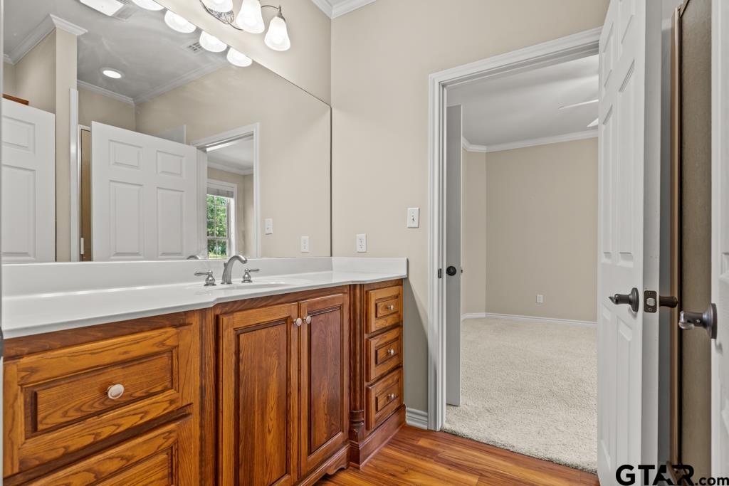 100 Lantana Road Gilmer, TX 75644 - Photo 19 of 30 a bathroom with a granite countertop sink mirror and double